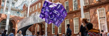 Students in University cafe with purple cube illustration