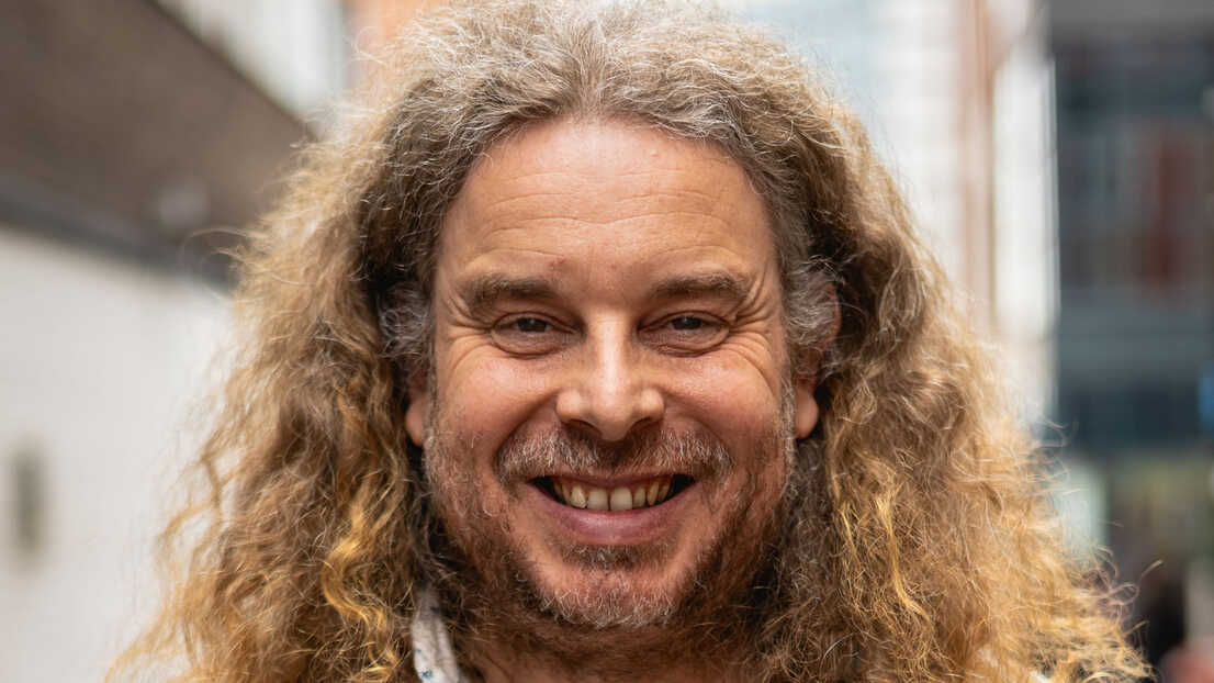 Headshot of Man smiling at camera 