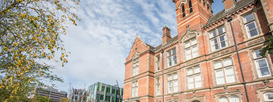 A wide shot showing the redbrick Jessop Building in the foreground and Jessop West behind it