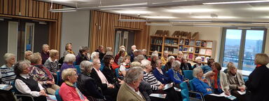 Members and guests attending a talk