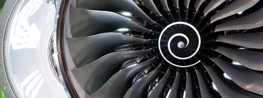 A Rolls Royce engineer inspects a turbine