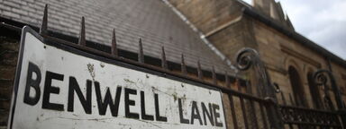 A photo of the Benwell Lane road sign