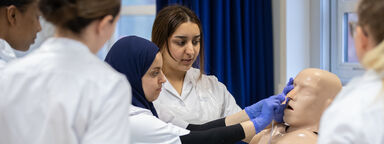 Students practising NG tube insertion