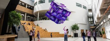 Girl with hovering cube illustrating study at Sheffield
