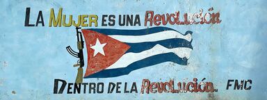 Street art mural in Havana Cuba which reads: "La Mujer es una Revolucion dentro de la Revolcion'