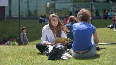 Students sat outside the Students' Union
