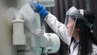 Researcher doing experiment