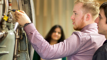 Three aerospace students on site