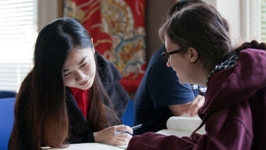 East Asian Studies postgraduate at desk