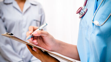 doctor with clipboard