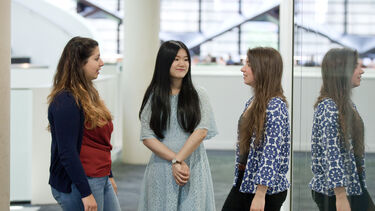 Three undergraduate students. 