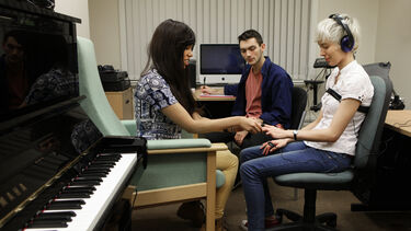 Music students carrying out research