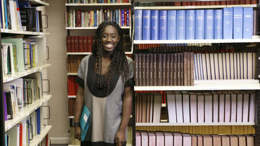 DLL Psychology student in library 