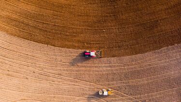 Tractor ploughing field