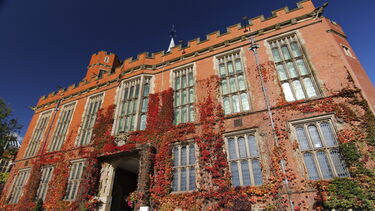 Firth Court with red vines growing up the walls - image 