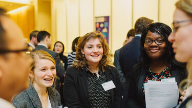 Students and alumni volunteers at a City Connections event