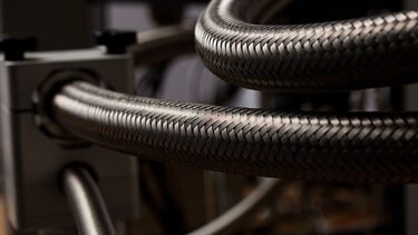 Cables feeding into a NMR spectrometer