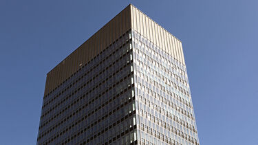 An exterior photo looking up at the Arts Tower.