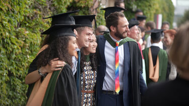 Students having their photograph taken at Graduation
