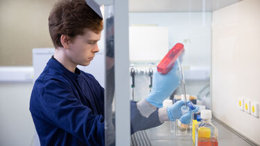 An oncology student in the lab