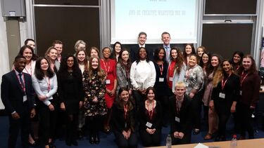 Students meeting alumni Ade Solanke