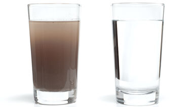 discoloured glass of water
