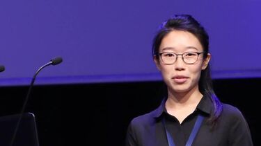Medical School graduate Jane Jiang giving a presentation - image 
