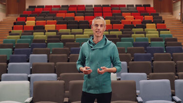 Alumni volunteer, Tobias Oliver in the Students' Union auditorium