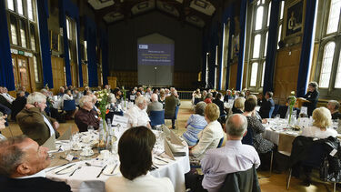 Alumni listening to the guest speaker