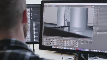 A computer screen shows a CGI visual reconstruction of Sheffield Castle.