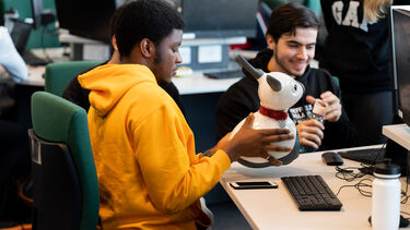 Student with MiRo robot