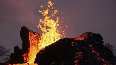 A close-up photo of an erupting volcano.