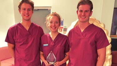 Miss Helena Usher holding her award