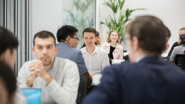 Postgraduate students in class