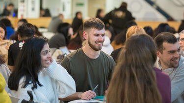 Postgraduate students in the Courtyard Café