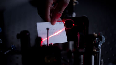 A laser shining in the Ultrafast Laser Spectroscopy Laboratory