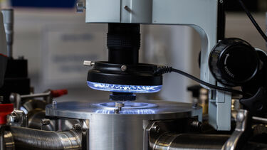 Close up photograph of a cryogenic probe station used by the SMD Group