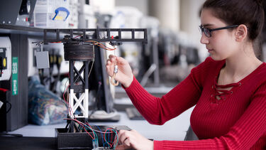 Female ACSE student in the lab