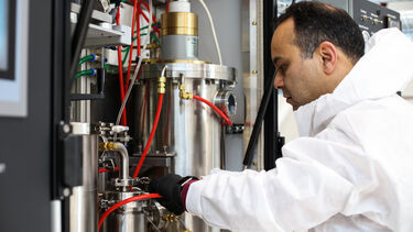 Researcher using equipment within the Royce research centre