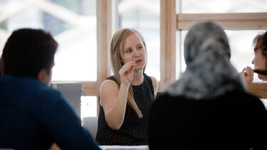 Kitty Nichols leads a seminar debate