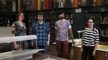 A group of postgraduate Philosophy students in Weston Bank library.