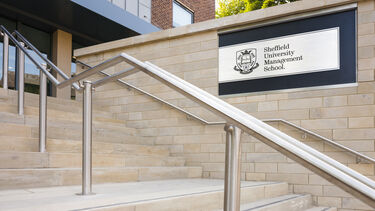 A sign for Sheffield University Management School located outside the Management School building