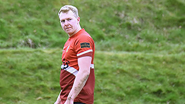 A photo of Sion in sports wear.