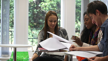 Politics students working at table