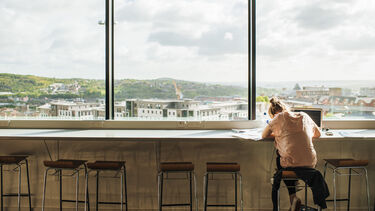 Student working in the IC at a computer