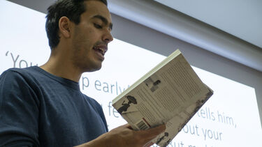 Guest author reading during presentation