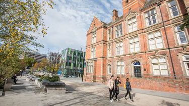 A wide shot showing the redbrick Jessop Building in the foreground and Jessop West behind it