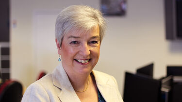 A profile photograph of Marie Kinsey. 