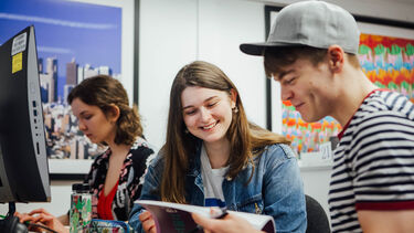 undergraduate students studying