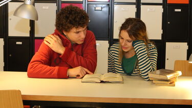 Two students working together 